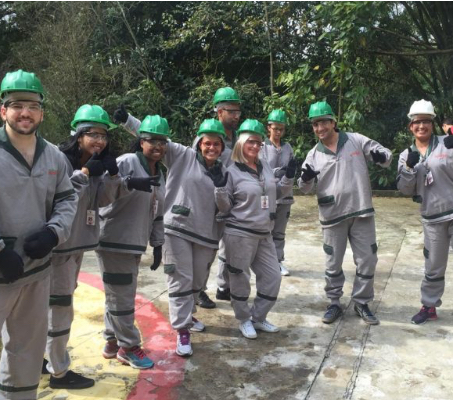 ADP associates on gray firefighting uniforms and green hardhats