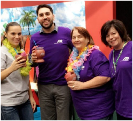 group of ADP associates in purple T-shirts