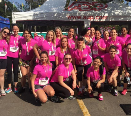Women ADP associates in pink T-shirts